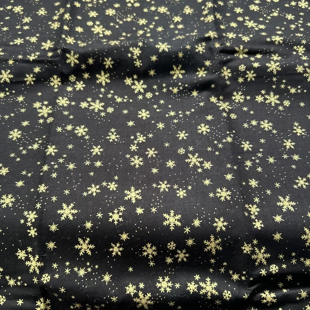 Wonders of Winter Black Gold Snowflake Quilting Fabric Laurie Godin Northcott